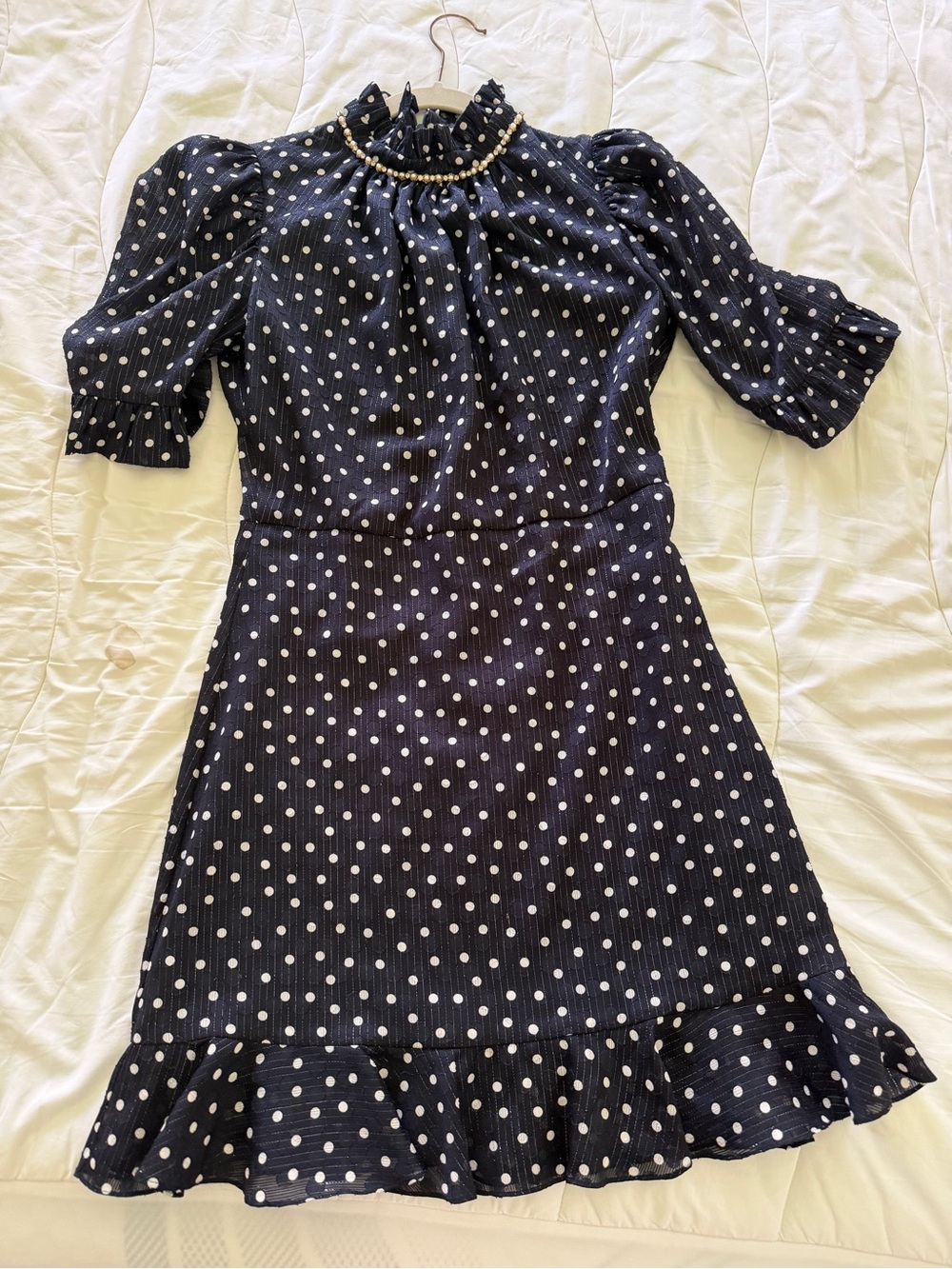 Polka Dot Ruffle-Hem Mini Dress in Black